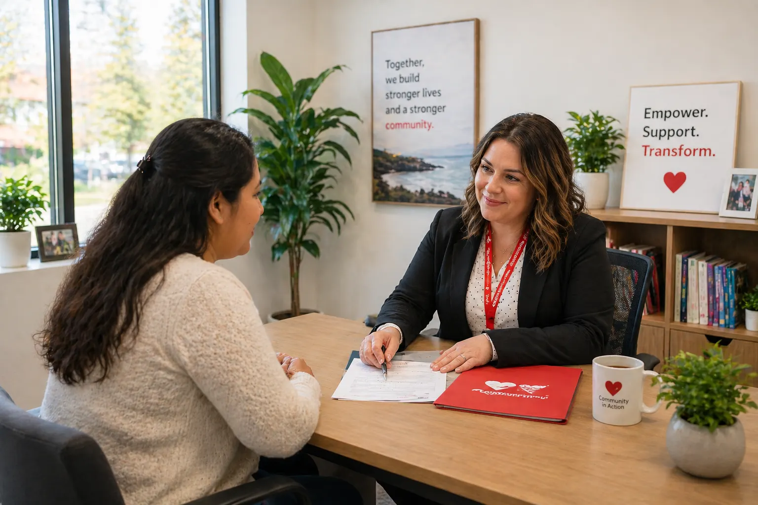 Case manager reviewing paperwork with a client across a desk